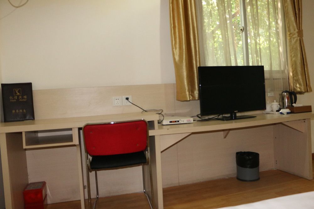 Yixin Business Hotel Гуанчжоу Екстер'єр фото